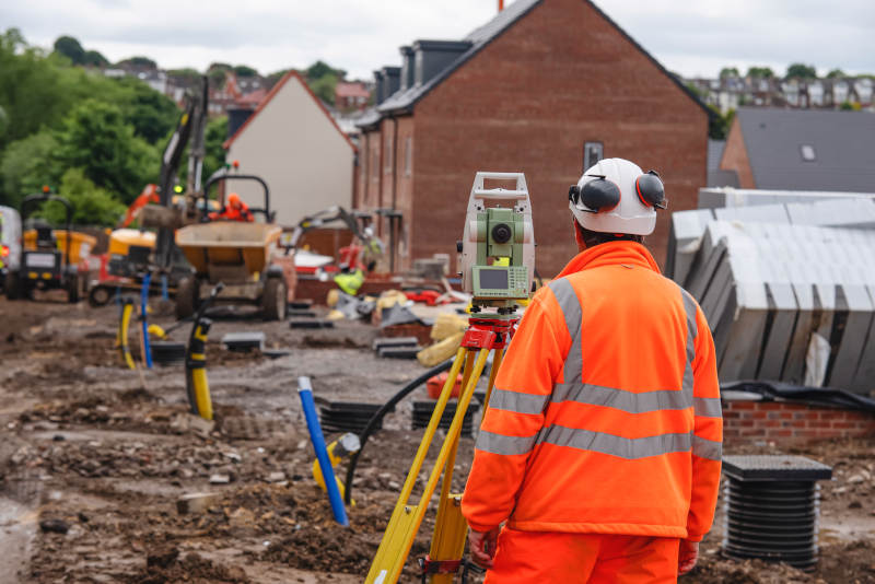 Image of a surveyor on site