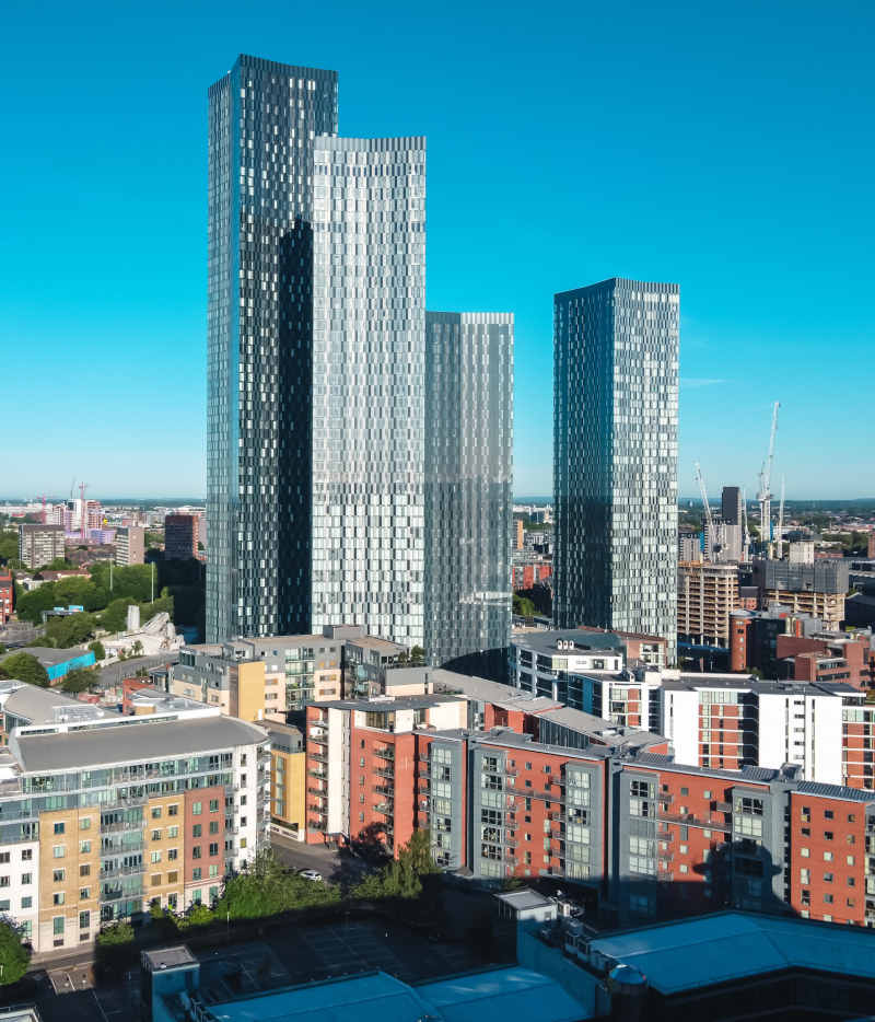 Image of house buyer being handed keys to their new home